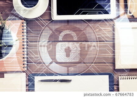 Business workplace with tablet pc and security concept on screen Business workplace with tablet pc and security concept on screen 67664783