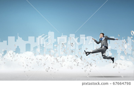 Businessman jumping high Businessman jumping high 67664798