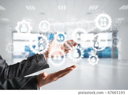 Cogwheels and gears mechanism as social communication concept Cogwheels and gears mechanism as social communication concept 67665193