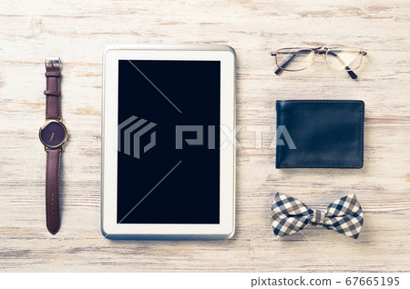 Gentleman kit of tablet watch glasses bow tie and notebook on wo Gentleman kit of tablet watch glasses bow tie and notebook on wo 67665195