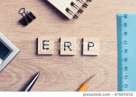 Enterprise Resource Planning concept spelled on table with wooden elements Enterprise Resource Planning concept spelled on table with wooden elements 67665858
