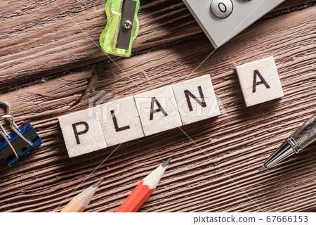 Conceptual business keywords on table with elements of game making crossword Conceptual business keywords on table with elements of game making crossword 67666153