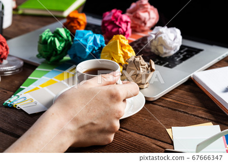 Woman blogger or columnist relax with coffee Woman blogger or columnist relax with coffee 67666347