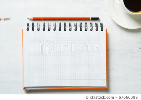 Coffee with notepad and pen 67666389