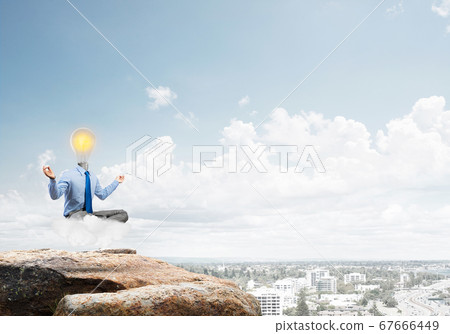Businessman relaxing and waiting for inspiration Businessman relaxing and waiting for inspiration 67666449
