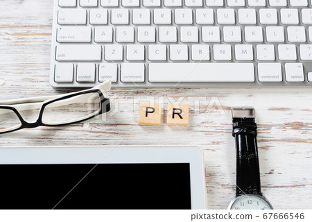Public relations concept with PR letters on cubes 67666546