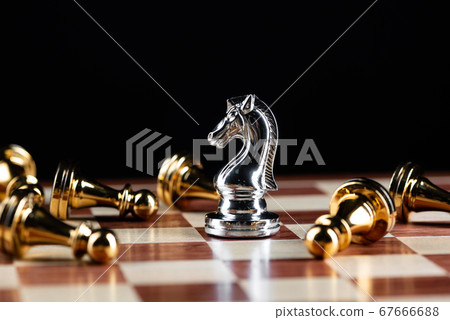 Silver knight chess defeats gold pawns on board. 67666688