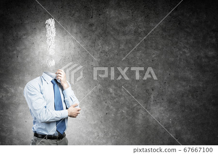 Pensive headless businessman Pensive headless businessman 67667100