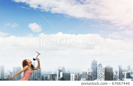 Girl screaming in loudspeaker 67667446