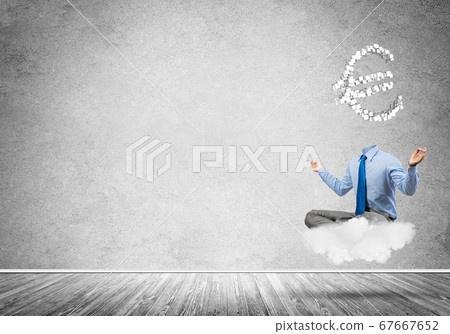 Headless meditating businessman 67667652