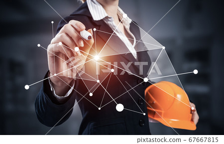Businesswoman pointing on abstract 3d network 67667815
