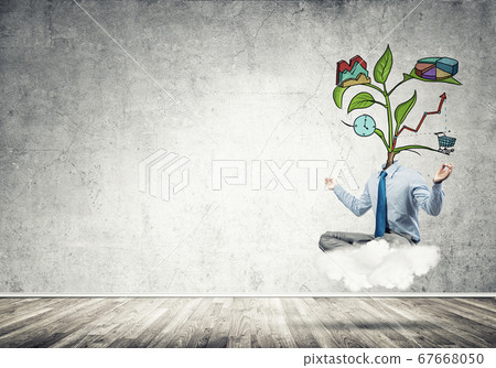 Headless businessman meditating Headless businessman meditating 67668050