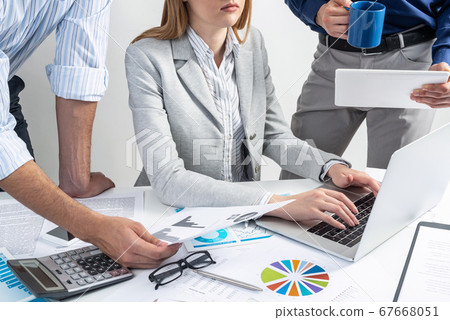 Business team working with documents 67668051