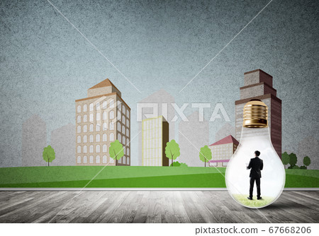 Businessman trapped in bulb Businessman trapped in bulb 67668206