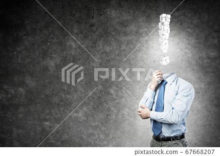 Pensive headless businessman Pensive headless businessman 67668207