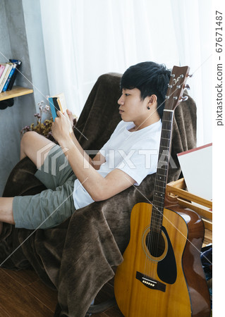 Reading a book. Reading a book. 67671487