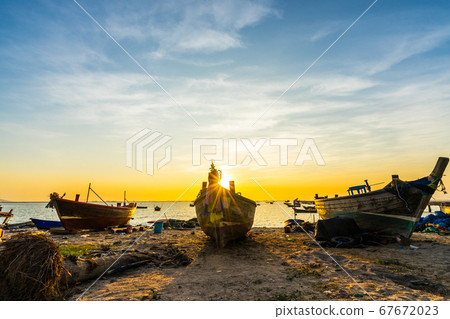 Fishing boat on beach in sunset at Bang phra Fishing boat on beach in sunset at Bang phra 67672023