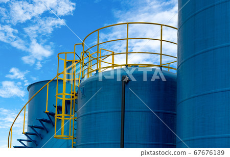 Closeup fuel storage tank in petroleum refinery. Closeup fuel storage tank in petroleum refinery. 67676189