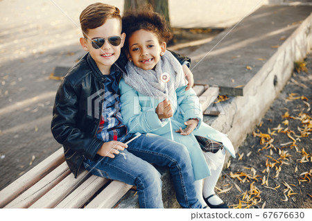 children in a park children in a park 67676630