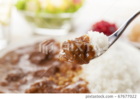 Scene of scooping beef curry cooked for a long time with a spoon Scene of scooping beef curry cooked for a long time with a spoon 67677022