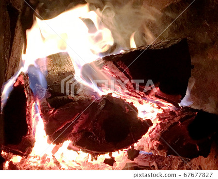 Beautiful red flame from slice wood 67677827