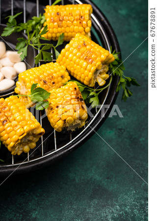 Grilled corn. Summer vegan food Grilled corn. Summer vegan food 67678891