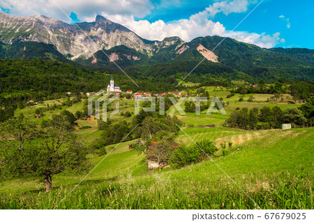 Beautiful summer alpine landscape and Dreznica village with mountains, Slovenia 67679025