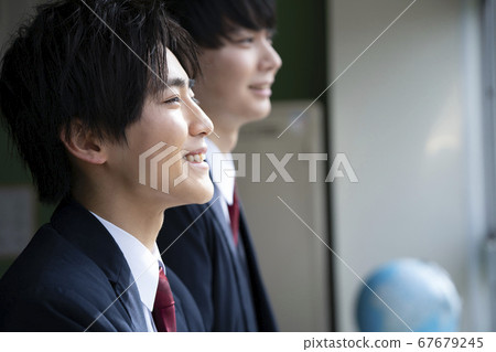 Students spending time with friends in the classroom 67679245