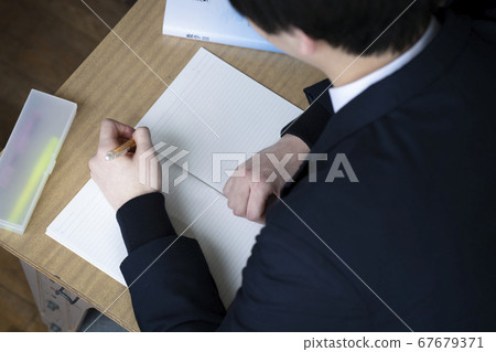 Students studying in a classroom 67679371