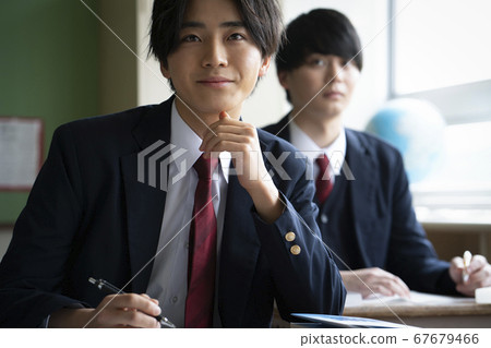 Students studying in a classroom 67679466