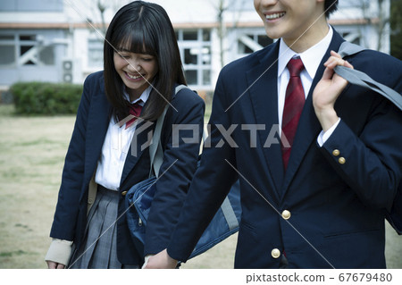 Student couple going home 67679480