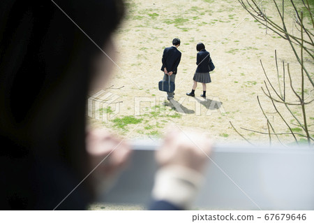 Student watching the couple 67679646