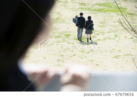 Student watching the couple 67679658