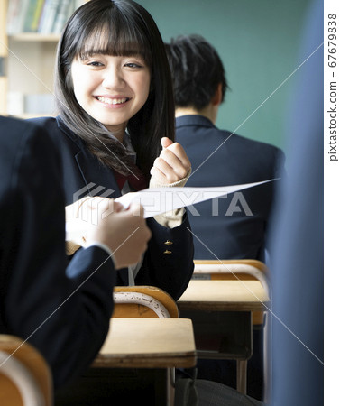 Students studying in a classroom 67679838