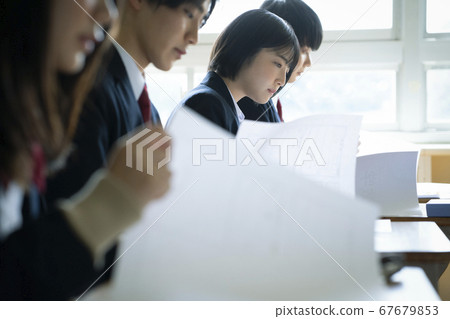 Students studying in a classroom 67679853