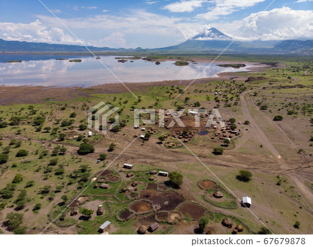 Aerial view of Maasai boma or family rural village on the coast of Salty lake Natron in the Great Rift Valley, Tanzania Aerial view of Maasai boma or family rural village on the coast of Salty lake Natron in the Great Rift Valley, Tanzania 67679878