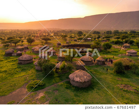 Aerial Drone Shot. Traditional Masai village at Sunset time near Arusha, Tanzania 67681497