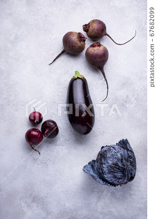 Assortment of raw purple vegetables Assortment of raw purple vegetables 67682099