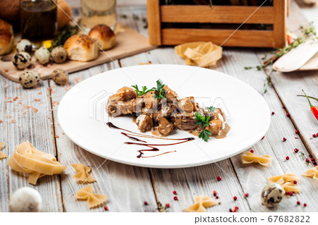 Gourmet veal medallions with champignons Gourmet veal medallions with champignons 67682822