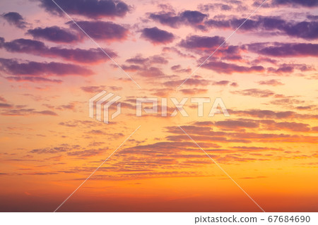 Dramatic colorful red purple to blue sunset or sunrise sky landscape. Natural beautiful cloudscape dawn background wallpaper. Stormy windy nature twilight dusk scene panorama 67684690