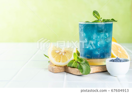 Blue matcha lemonade on white background 67684913