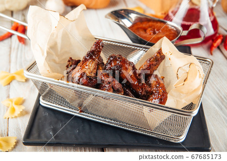 Beer appetizer roasted buffalo chicken wings Beer appetizer roasted buffalo chicken wings 67685173