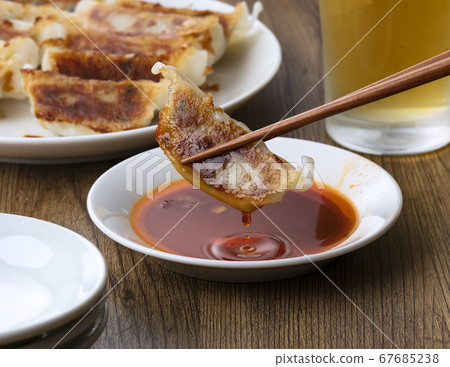 Grilled dumplings and beer Grilled dumplings and beer 67685238