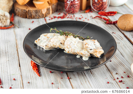 Tender turkey fillet steak in cream sauc rosemary 67686014