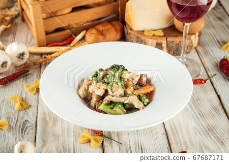 Rabbit roast in creamy sauce with new potatoes Rabbit roast in creamy sauce with new potatoes 67687171