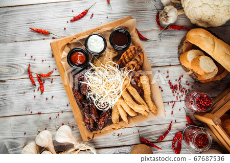 Big assorted chicken platter set with sauces Big assorted chicken platter set with sauces 67687536