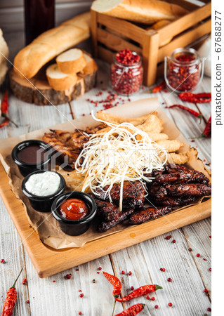 Big assorted chicken platter set with sauces Big assorted chicken platter set with sauces 67688277