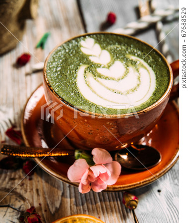 Asian decorated matcha green tea latte art Asian decorated matcha green tea latte art 67688529
