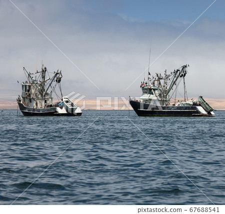 fishing boats in the bay of the Pacific Ocean fishing boats in the bay of the Pacific Ocean 67688541