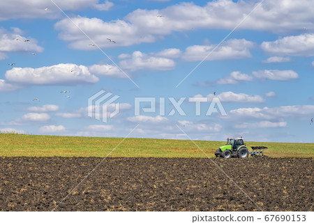 prepare field for cultivation. 67690153